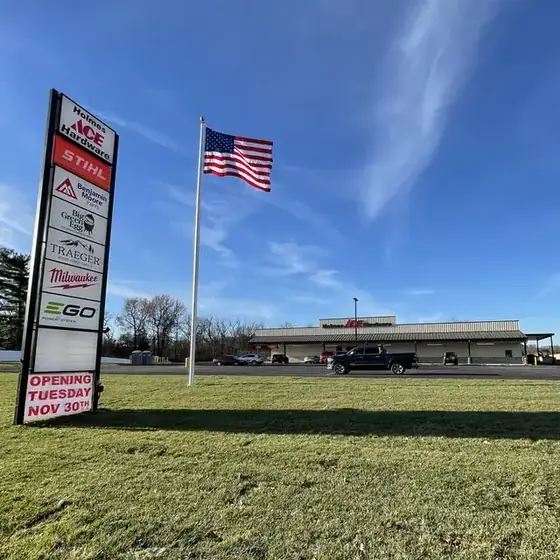 Holmes Ace Hardware road sign announcing the November 30 opening